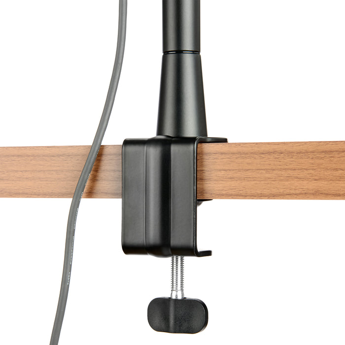 The Microphone Arm is a versatile solution that features height adjustment, built-in cable management, and secure mounting for microphones up to 1 kg.