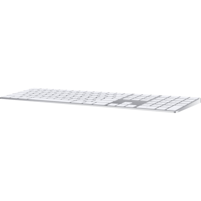 A sleek, low-profile Apple Magic Keyboard with a premium silver aluminum finish and minimalist white keys.