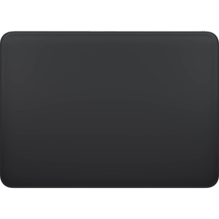 Top-down view of the black Apple Magic Trackpad featuring a minimalist glass surface, designed for Multi-Touch gestures and Force Touch with Mac and iPad.