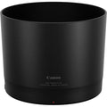 Black Canon lens hood on a white background