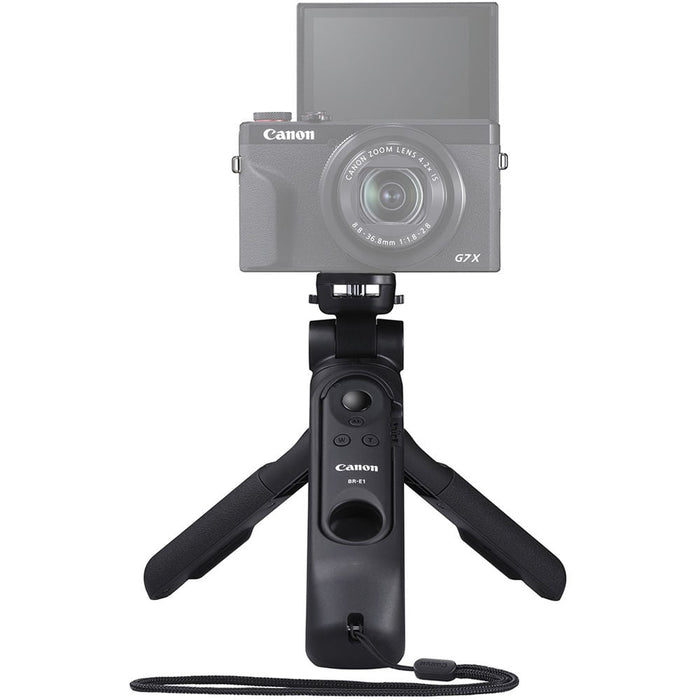 Canon HG‑100TBR Tripod Grip—black and dark grey handheld grip with 1/4‑inch tripod threads, ergonomic textured body, wrist strap attachment, and collapsible design for tripod and gimbal support.