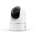 White security camera with black lens on a white background, featuring the eufy brand.