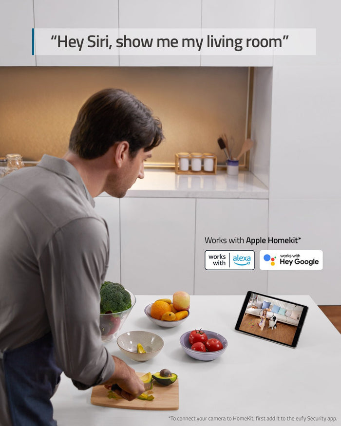 Person using a tablet with a home automation app, showing compatibility with Apple Homekit, Amazon Alexa, and Google Assistant.
