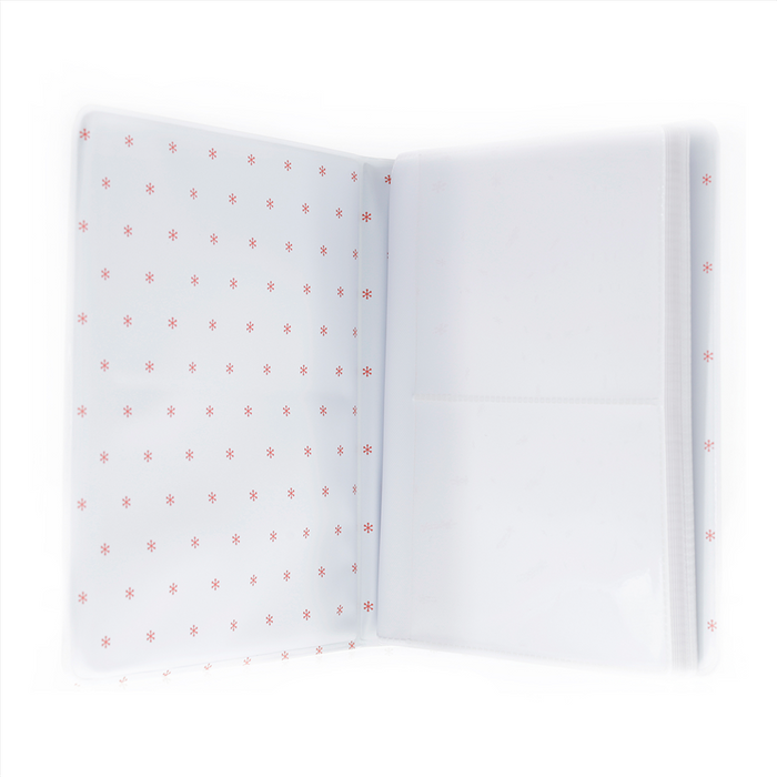 Open notebook with red star pattern on white pages