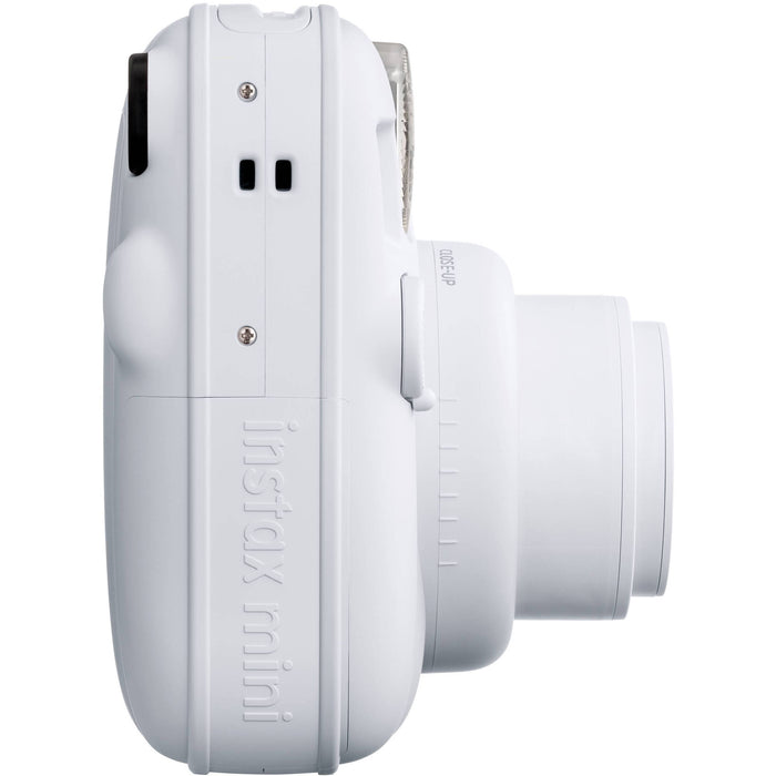 Fujifilm INSTAX Mini instant camera with built-in flash and optical viewfinder.