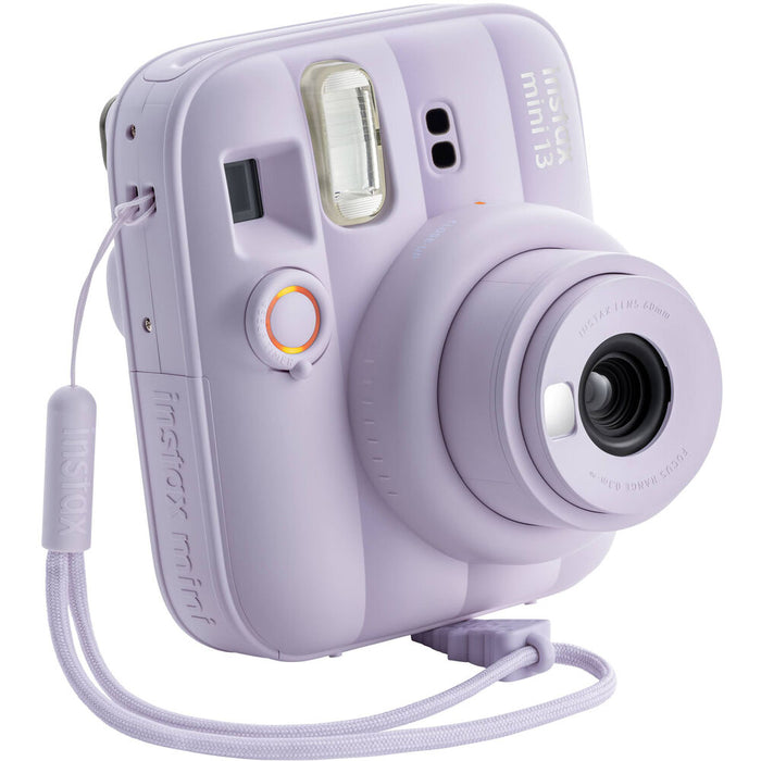 Angled profile of pastel Dreamy Purple Instax 13 with wrist strap