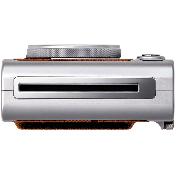 Fujifilm Instax Mini Evo Instant Film Camera (Brown) – stylish hybrid instant camera with retro brown design, digital display, lens and film effects, and instant printing.