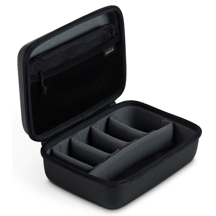 Black travel case with compartments on a white background