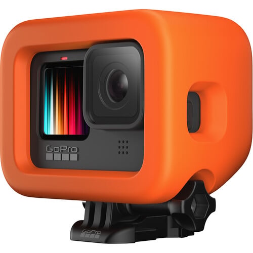 GoPro camera with an orange protective case on a white background