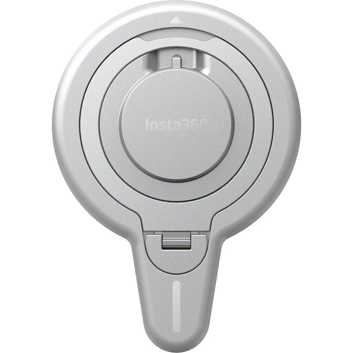 Insta360 Flow 2 Pro Magnetic Phone Mount with strong N52-grade magnets designed to securely hold MagSafe-compatible iPhone 12 or later models, featuring a 360° rotatable metal ring stand that doubles as a desktop phone stand, lightweight aluminum and silicone build, and compact 8.1 x 5.6 x 0.5 cm size.