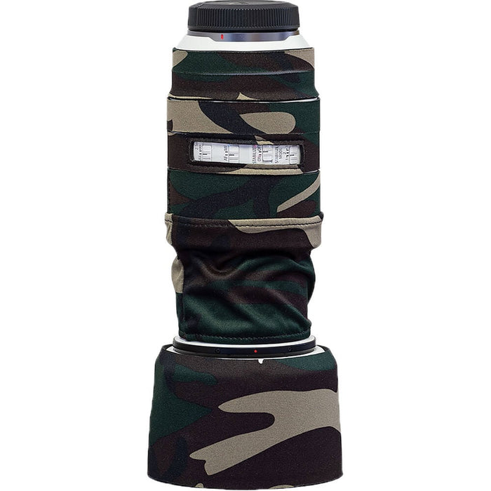 Camouflage lens hood on a camera lens with a white background