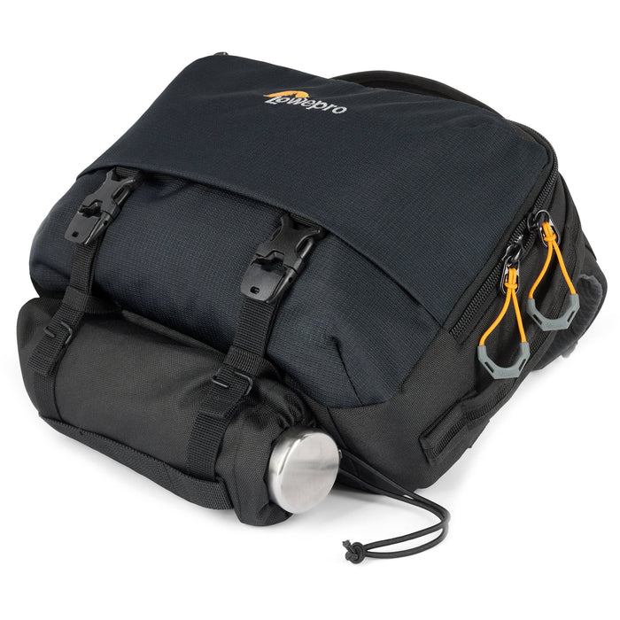 Eco-friendly Lowepro Trekker Lite SLX 120 camera bag with padded compartments and accessories