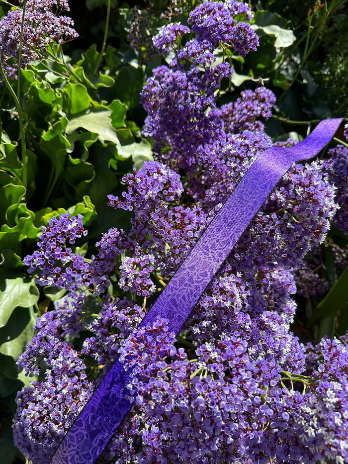 Lunar Camera Strap in lavender color, durable and stylish for comfortable camera carrying.