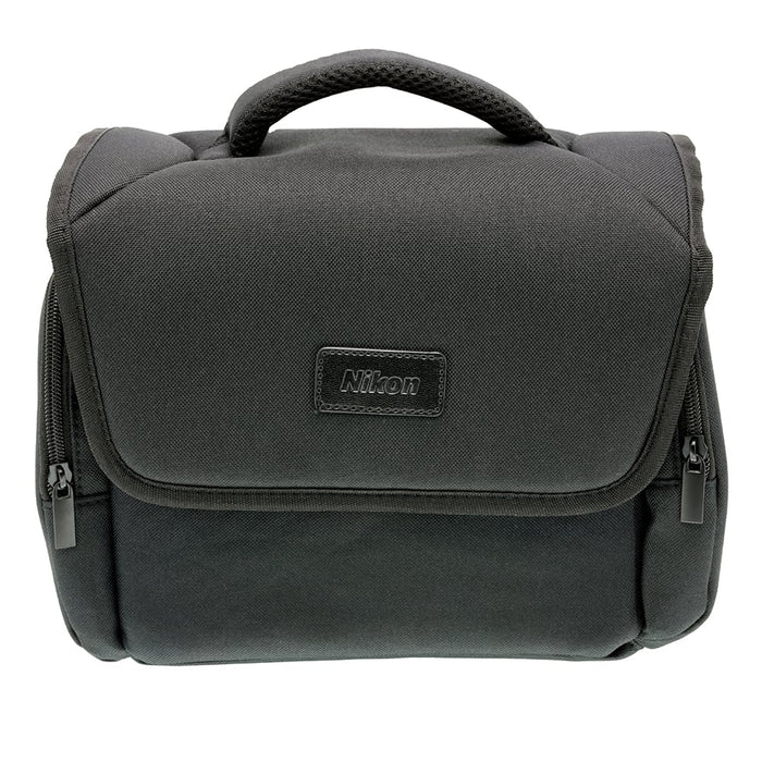 Black Nikon shoulder bag for camera, lenses, and accessories with padded interior.