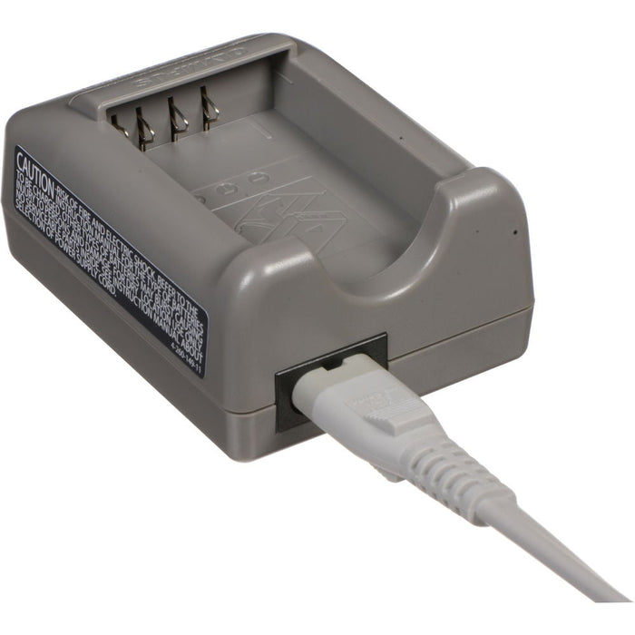 Olympus BCS-5 dedicated lithium-ion battery charger for BLS-5 and BLS-50 batteries, compatible with 100-240V AC international power supplies.