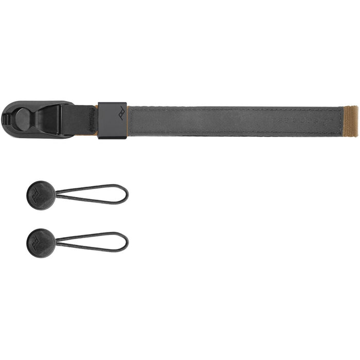 The Peak Design Cuff is a sleek, ultra-secure wrist strap with Dyneema-corded Anchors, holding over 90kg, perfect for protecting heavy cameras.