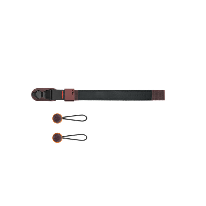 Keep your camera secure with the Peak Design Cuff Wrist Strap, featuring a durable nylon and leather build, adjustable fit and strong anchor links.