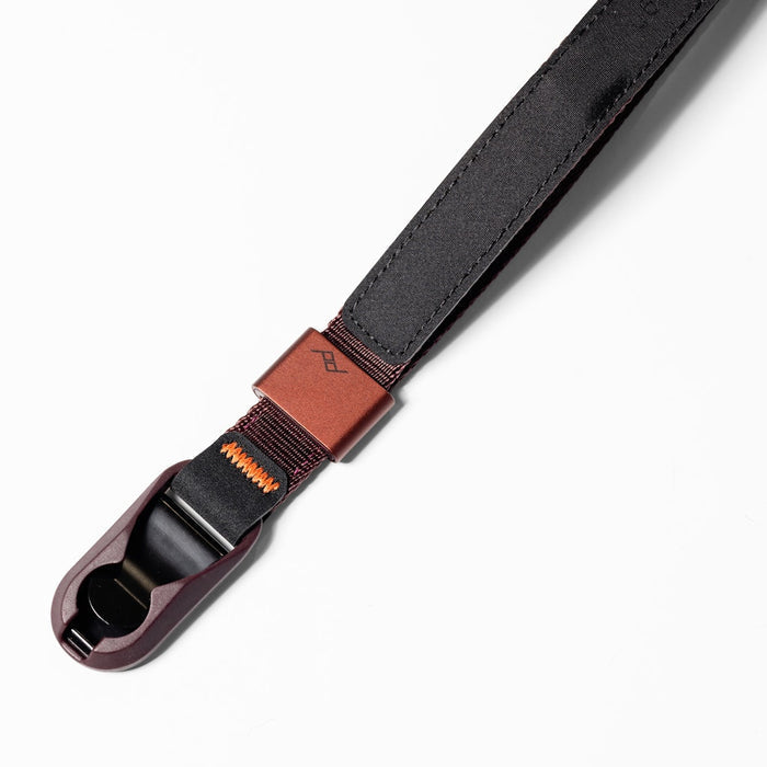 Keep your camera secure with the Peak Design Cuff Wrist Strap, featuring a durable nylon and leather build, adjustable fit and strong anchor links.
