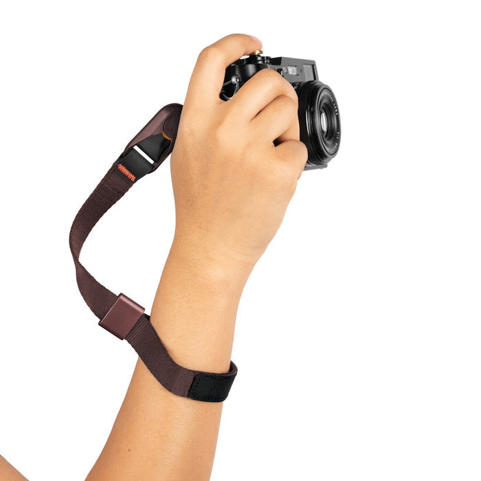 Keep your camera secure with the Peak Design Cuff Wrist Strap, featuring a durable nylon and leather build, adjustable fit and strong anchor links.