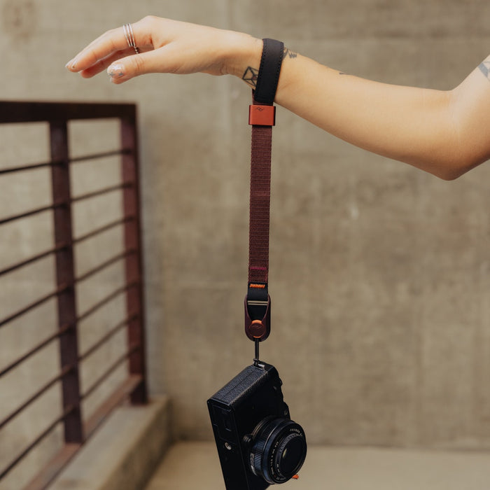 Keep your camera secure with the Peak Design Cuff Wrist Strap, featuring a durable nylon and leather build, adjustable fit and strong anchor links.