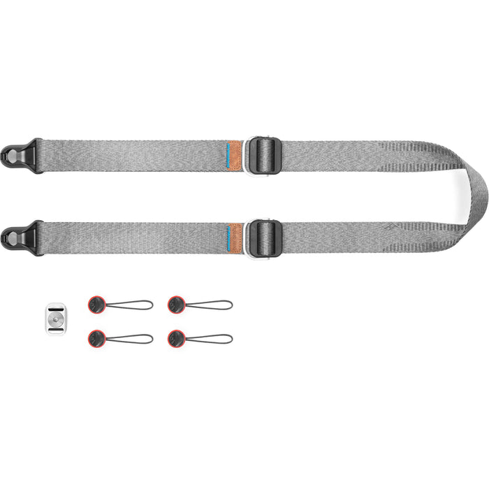 Versatile camera strap in Grey with quick-release anchors, adjustable 99–145 cm length and 90.7 kg capacity for secure, comfortable carry.