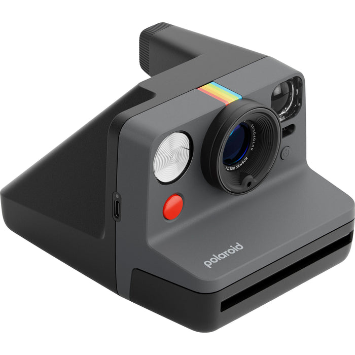 Polaroid Now Generation 3 Starter Set in black, featuring upgraded two-lens autofocus system, double-exposure and self-timer modes, built-in tripod mount, accurate flash, USB-C rechargeable battery, made with 40% recycled plastics, compatible with Polaroid i-Type and 600 film."