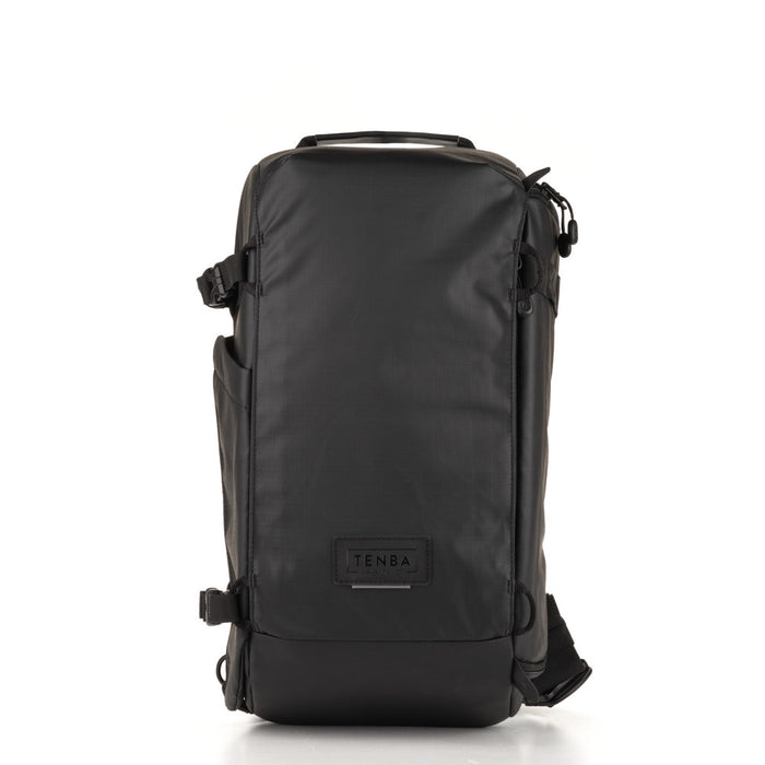Black backpack with 'Tenba' logo on a white background