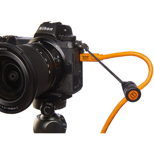 Tether Tools TetherGuard Camera Support attached to camera with tether cable.