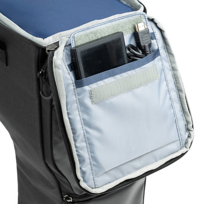 Think Tank Digital Holster 150 for 150–600mm lenses with belt/shoulder carry and accessory pockets.