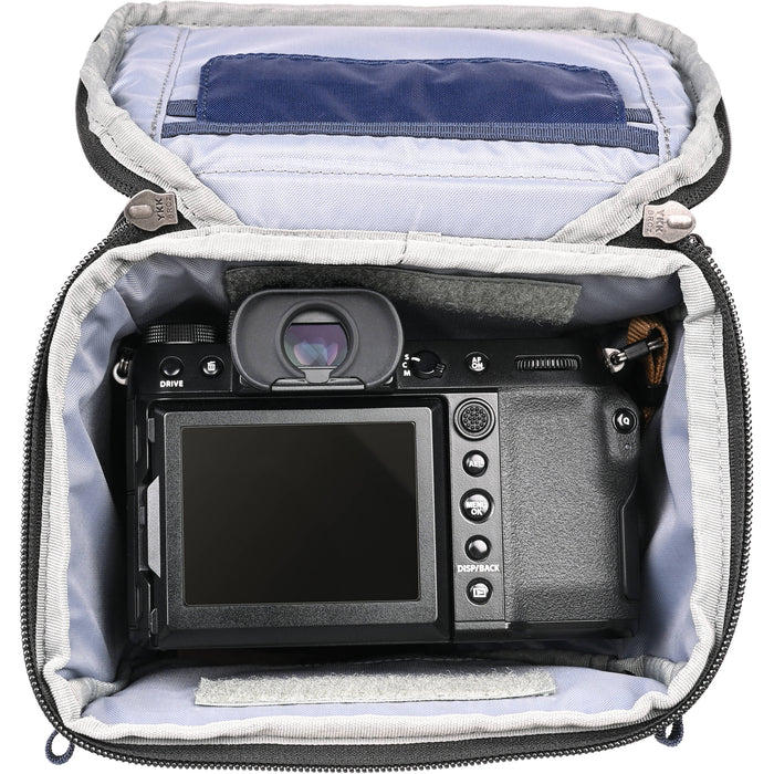 Think Tank Digital Holster 30 V3 camera bag with quick-access lid, belt attachment, and rain protection.