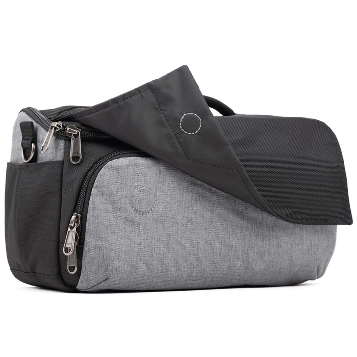 Think Tank Photo Mirrorless Mover 25 camera shoulder bag, black, compact with flip-top lid, multiple pockets, padded interior for mirrorless camera and lenses, rain cover included