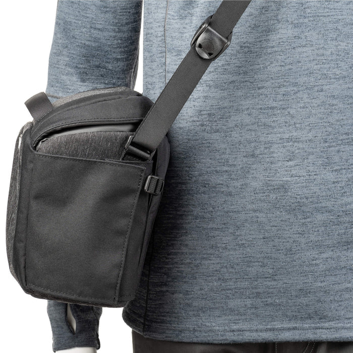 Think Tank SpeedTop 10 — compact crossbody camera bag with magnetic top lid and adjustable strap.