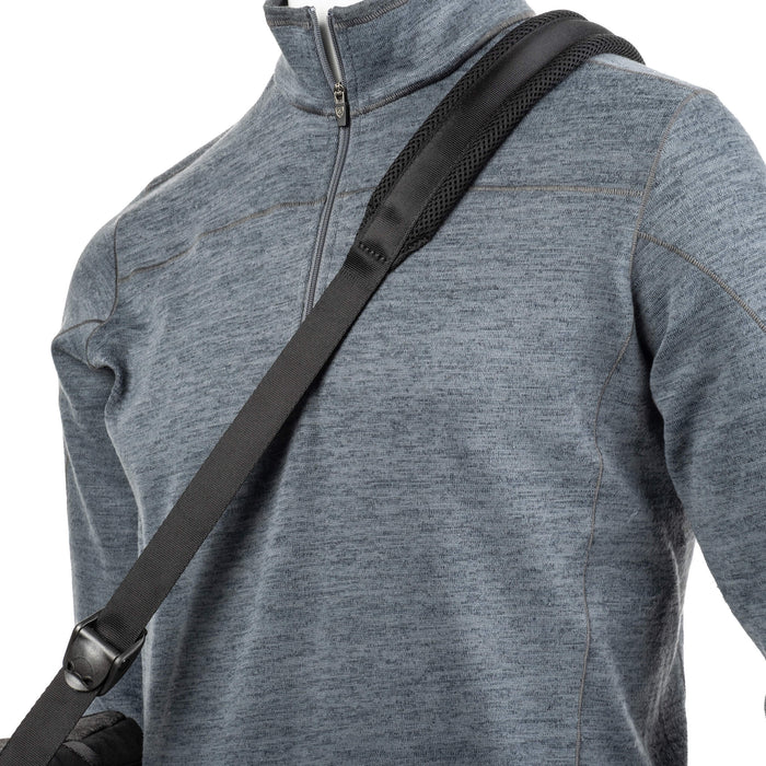 Think Tank SpeedTop 10 — compact crossbody camera bag with magnetic top lid and adjustable strap.