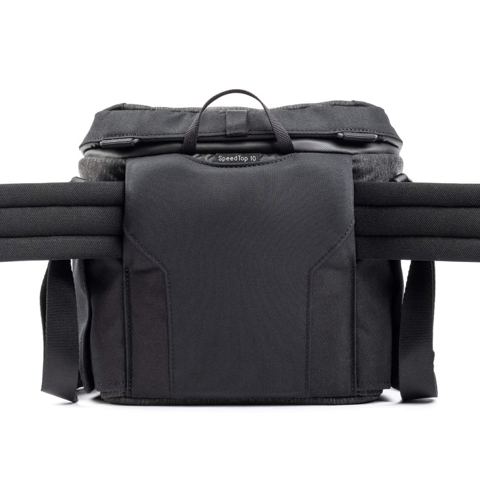Think Tank SpeedTop 10 — compact crossbody camera bag with magnetic top lid and adjustable strap.