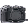 Tilta Full Camera Cage for Canon R8 in black, with multiple mounting points and cold shoe mounts.