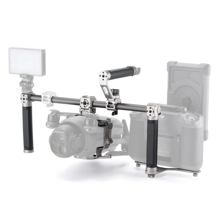 Modular camera cage with accessory mounts and audio integration for DJI Mavic 4 Pro.