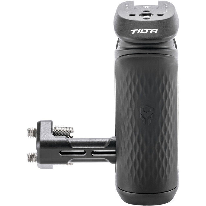Tilta Xeno Side Handle with dual 1/4"-20 screw mount in black, featuring an ergonomic non-slip silicone grip and a cold shoe receiver for camera cage mounting.