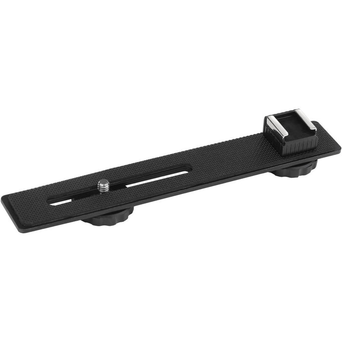 Black camera accessory on a white background